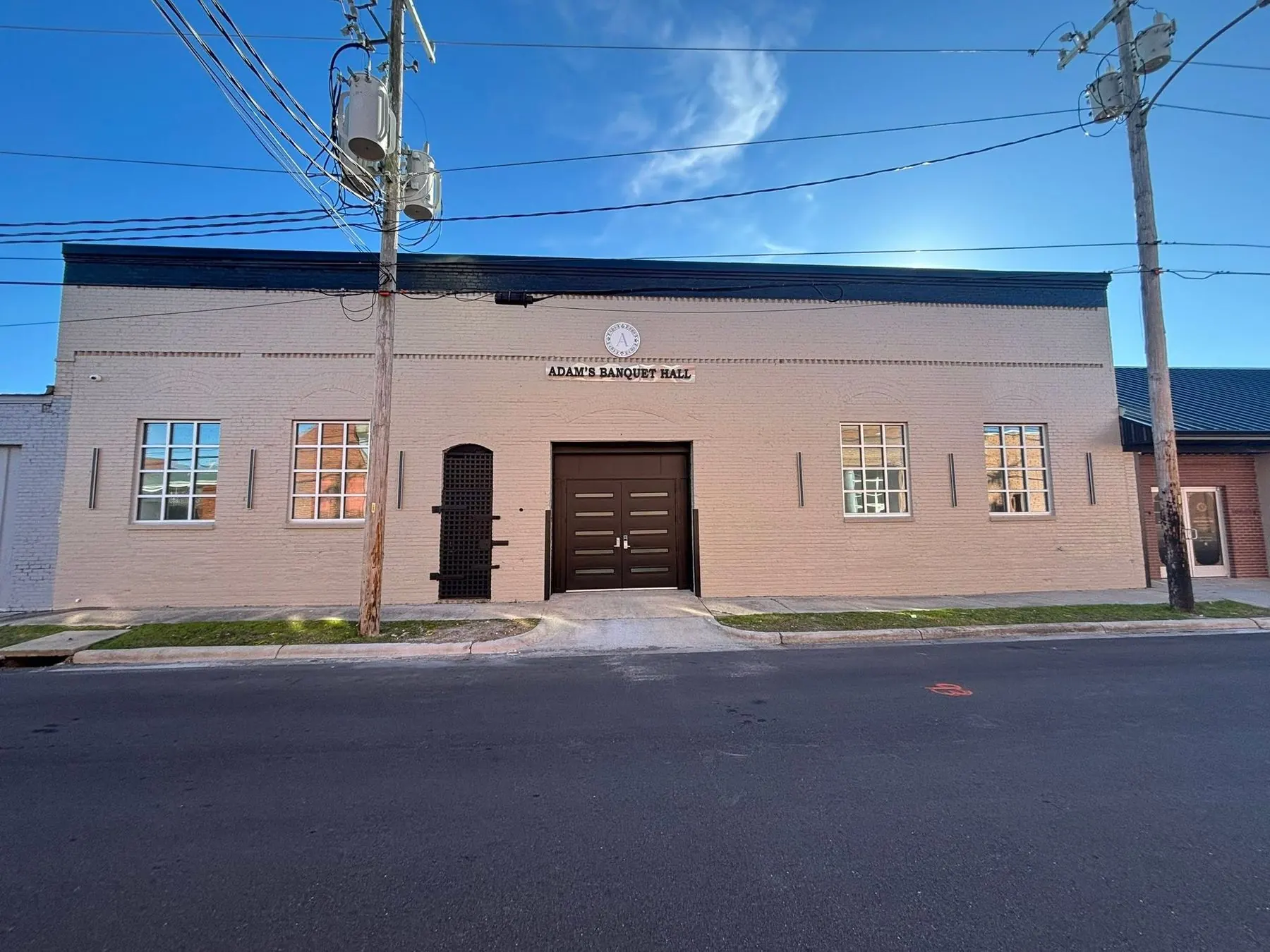 Adams Banquet Hall at dusk on South Chestnut Street