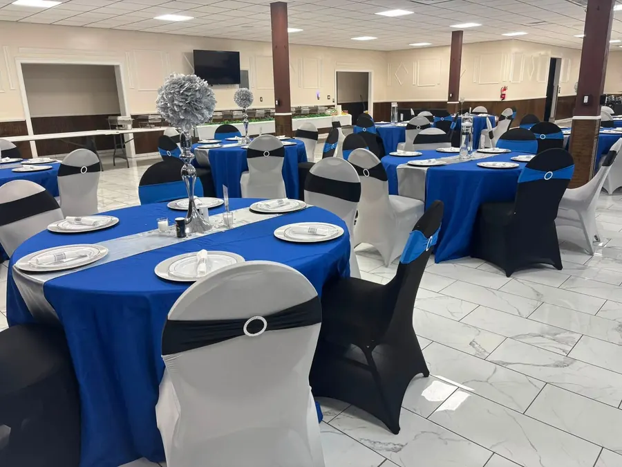 Royal blue linens and silver centerpieces